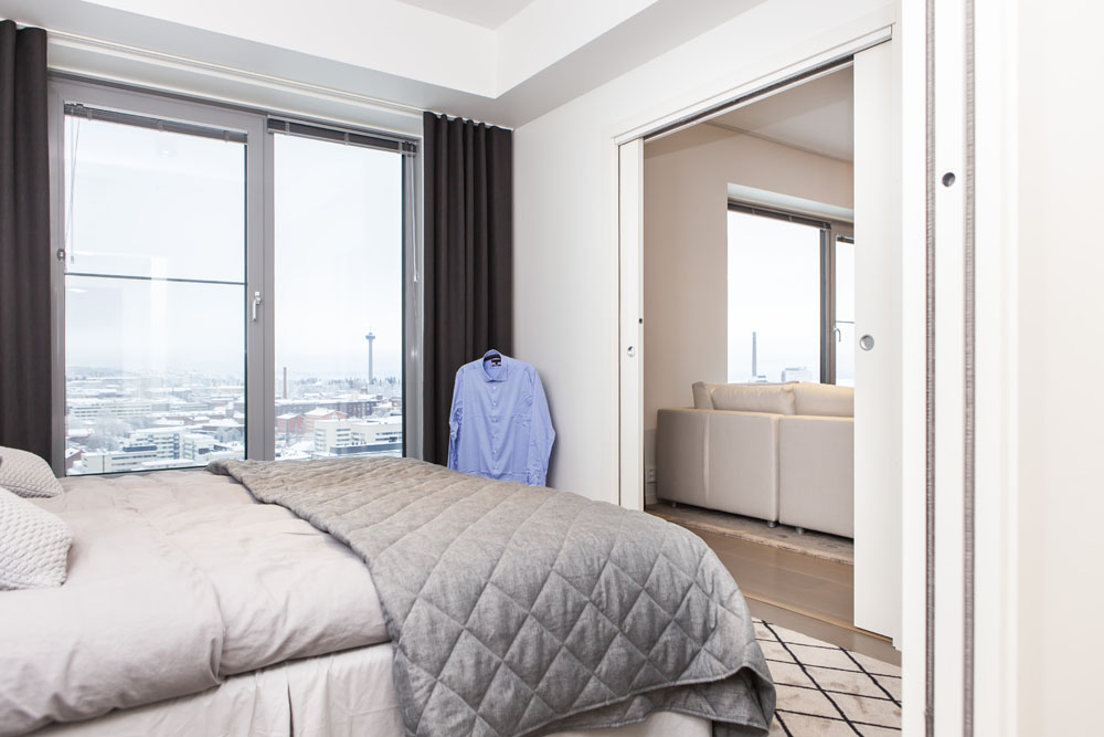 Camera da letto progetto Luminary con porte ECLISSE