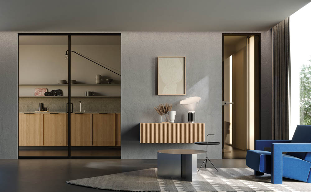 Eclisse porte filo muro in vetro e alluminio